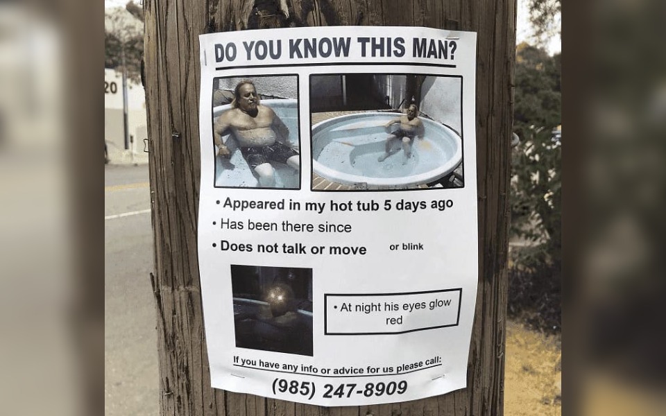 A street poster saying "Do You Know This Man?"