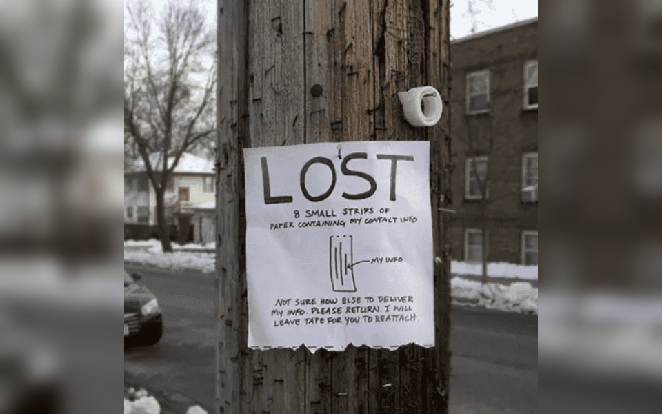 A street poster that reads "lost 8 small strips of paper"