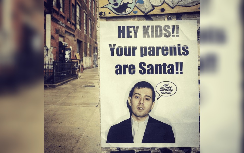 A street poster that reads "hey kids, your parents are Santa"
