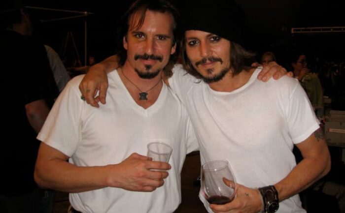 Johnny Depp and his "double" take a picture together.