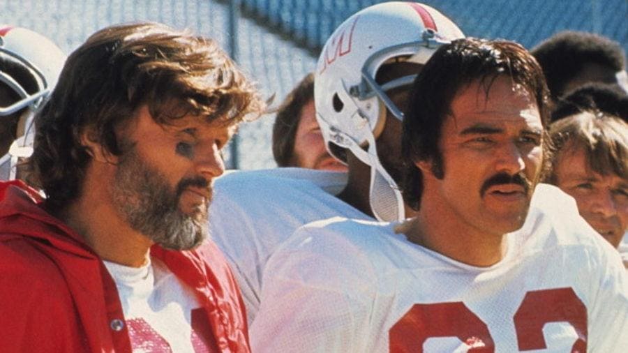 Photograph of Burt Reynolds and Kris Kristofferson in the movie 'Semi-Tough.’