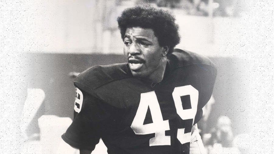 Photograph of Carl Weathers, number 49, playing for the Oakland Raiders.