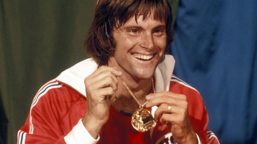 Photograph of Bruce Jenner with their Olympic medal.