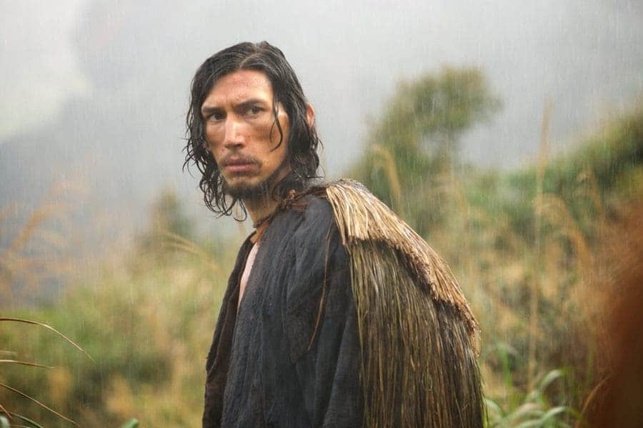Adam Driver in the rain from a scene in the film Silence. 