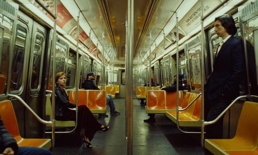 Adam Driver and Scarlet Johansson on the subway in the movie Marriage Story. 