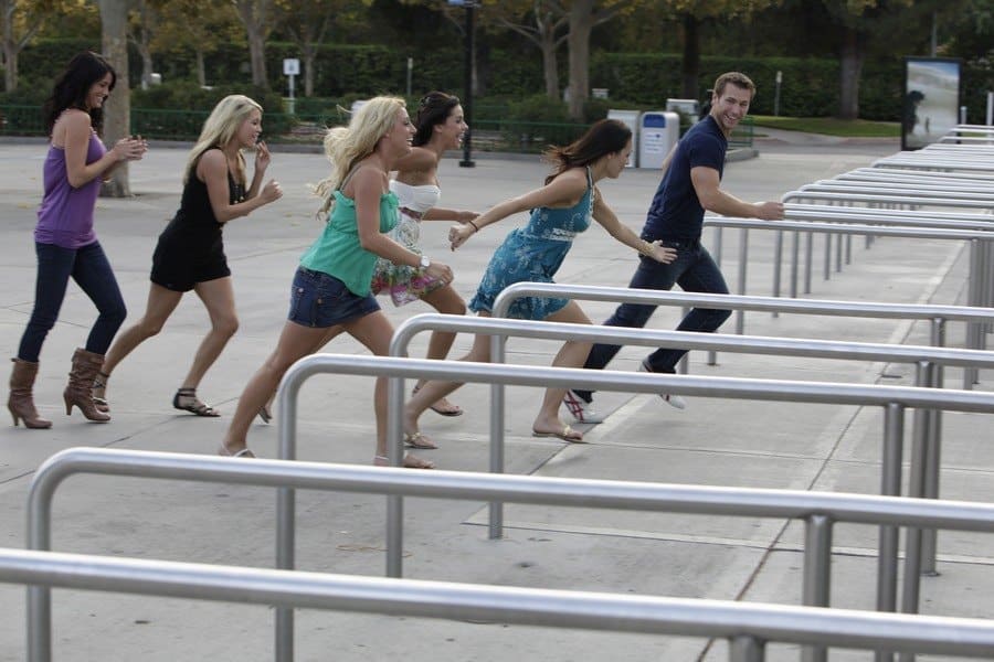 Jake Pevalka and the girls from his season of the Bachelor are running to win a date. 
