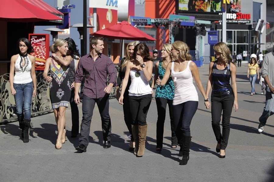 Jake Pevalka is walking around on a date with a bunch of the women from his season. 