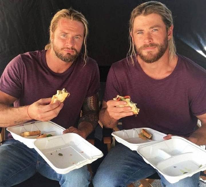 Chris Hemsworth on the left and Bobby Holland Hanton on the right, both dressed as Thor.