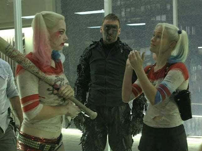 Margot Robbie and Ingrid Kleinig were posing with someone while dressed as Harley Quinn.