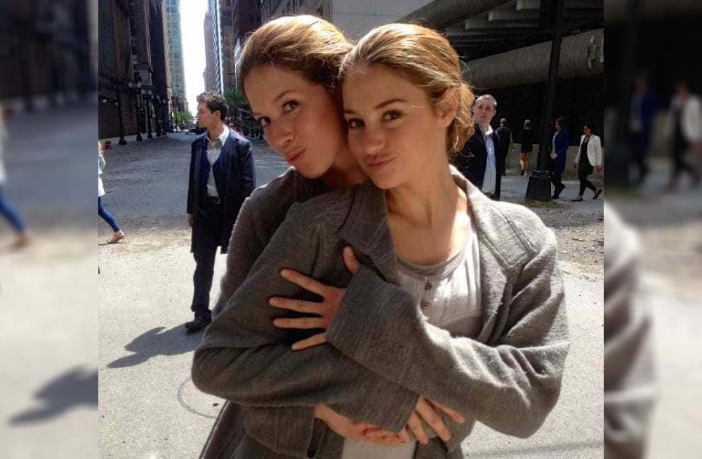 Shailene Woodley and Alicia Vela-Bailey are on the set of Divergent dressed alike.