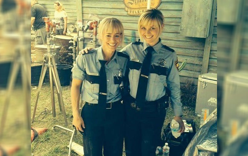 Reese Witherspoon and Marny Eng dressed as police officers for their film Hot Pursuit.