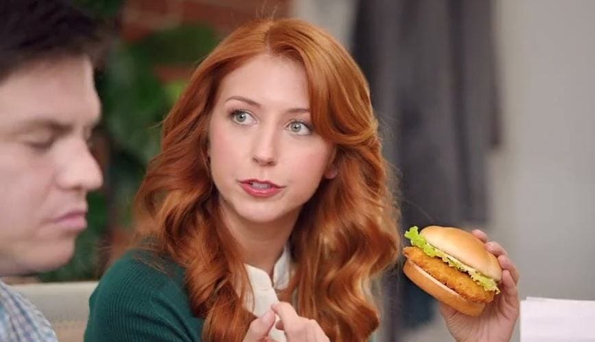 Morgan Smith-Goodwin holding a Wendy’s sandwich.