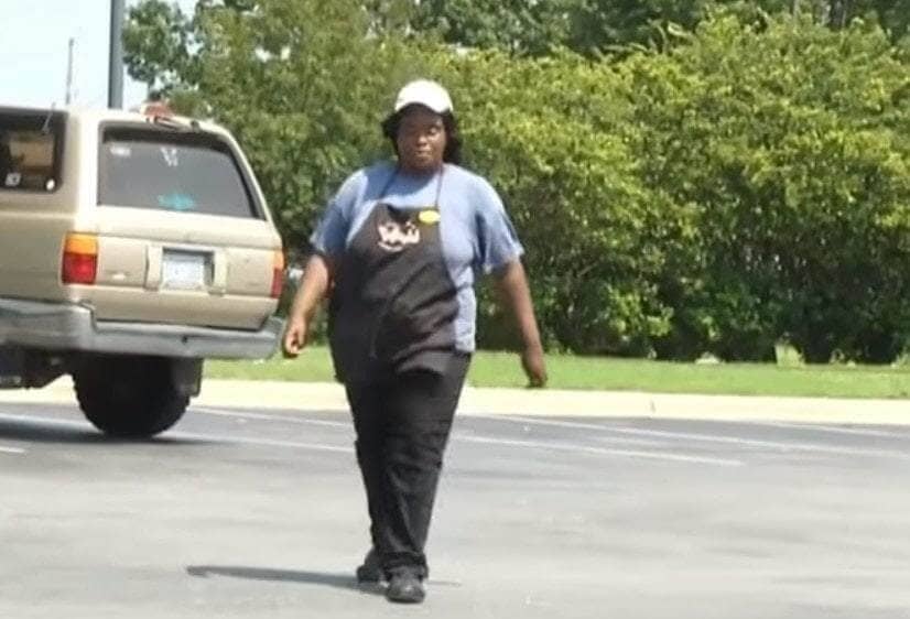 Jaylesya Corbett walking in her work uniform