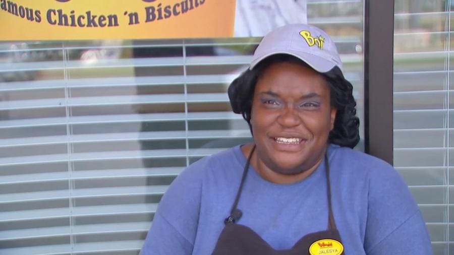 Jayleysa Corbett in front of her workplace