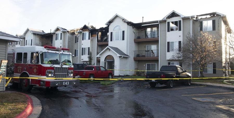 Houses after a fire with police tape
