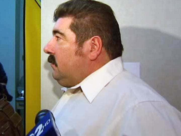 Photograph of America Lopes being interviewed by CBS after winning the lottery.