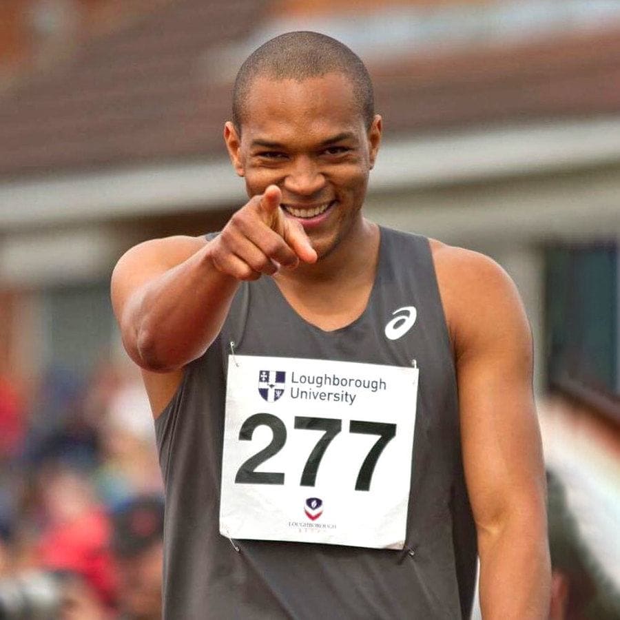 Photograph of Edi on the track running with the number 277 for Loughborough University. 