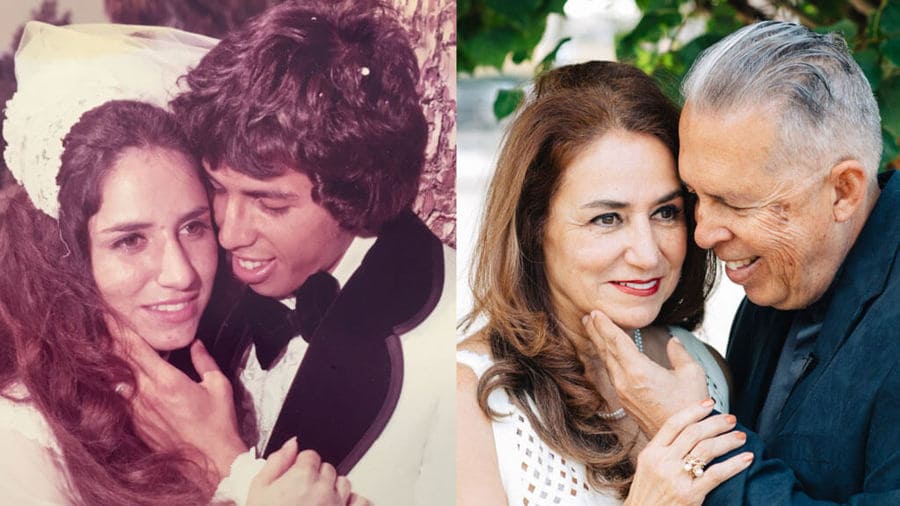 couple recreating their wedding photo together 