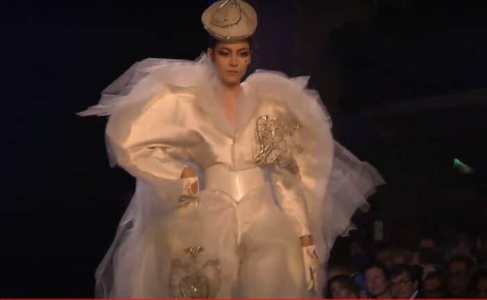 A girl wearing a funny wedding dress