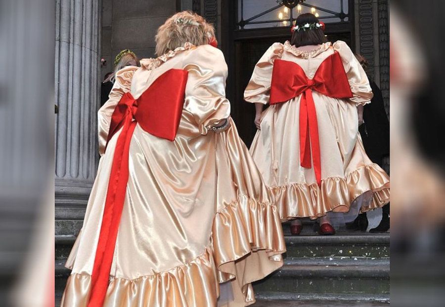 Bridesmaid dresses with huge red bows on the back