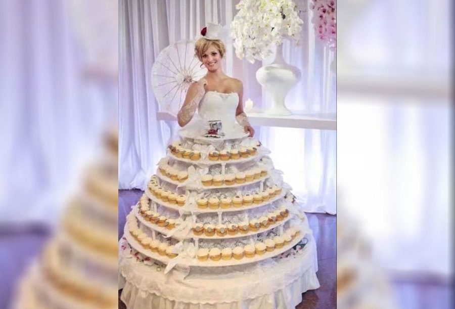 A bride wearing a cupcake wedding dress