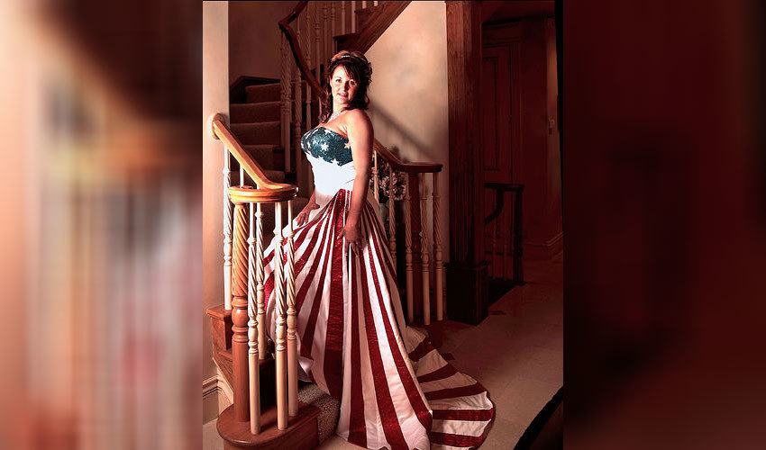A bride wearing an American flag wedding dress