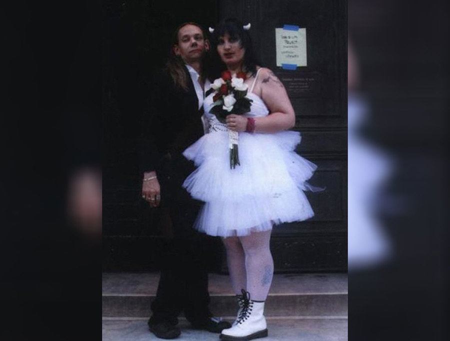 couple wearing their wedding cloths