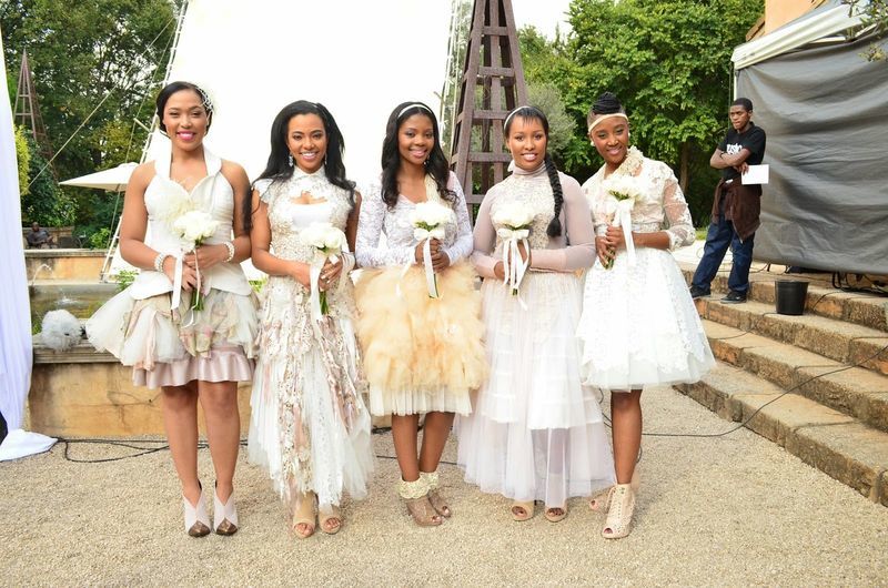 Bridesmaids dressed in white