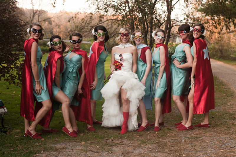 Bride and her bridesmaids in dressed in reed superhero gear!