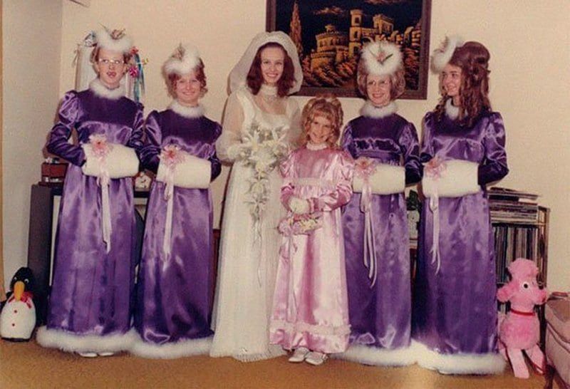 Bridesmaids wearing ugly velvet dresses