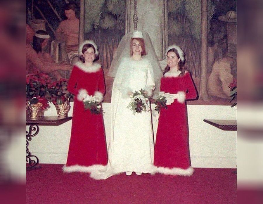 Creepy looking bride and her Santa looking bridesmaids