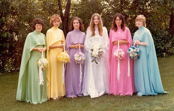 Bridesmaids looking scary in different color dresses