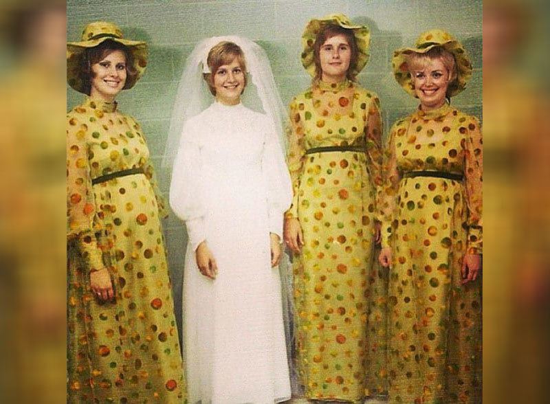 Bridesmaids wearing ugly yellow polka dot dress and a bride