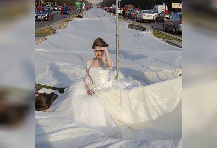 A wedding dress with a ridiculously long tail