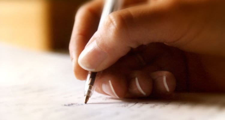 A handwriting with a pen. 