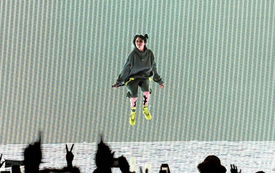 Billie Eilish mid-air at a concert in Atlanta in 2019.