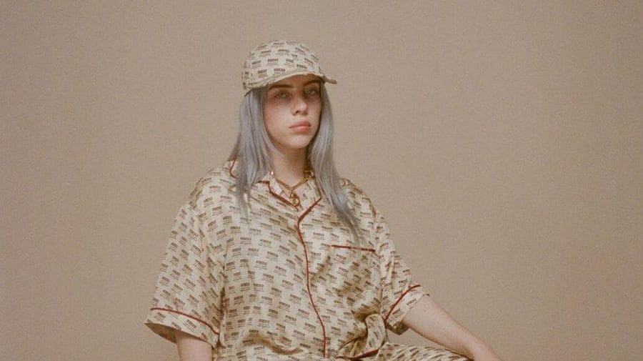 Billie Eilish in a hat matching her outfit in a photograph for Forbes 30 under 30.