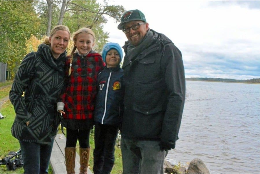 Saga Vanecek and her family beside a lake