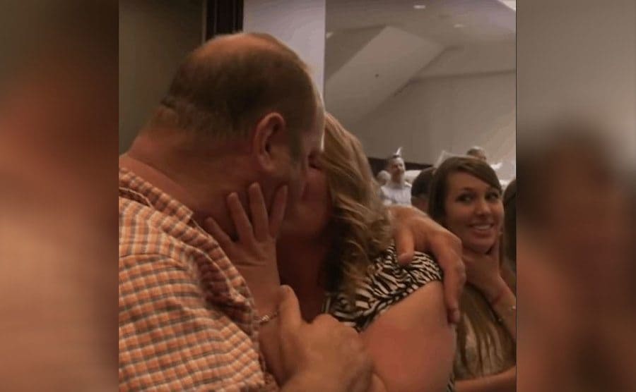 Loren kissing his wife 
