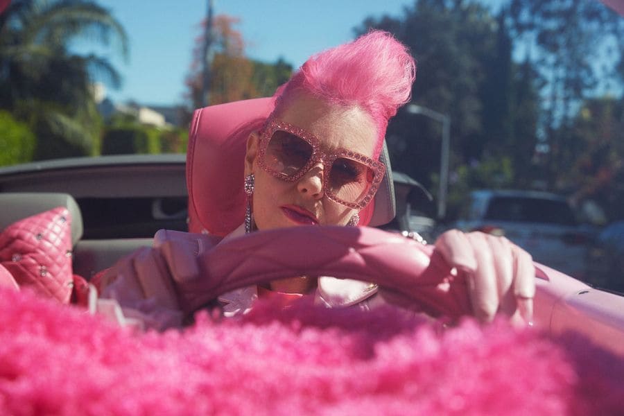 Kitten Kay Sera is driving her customized pink Volkswagen.
