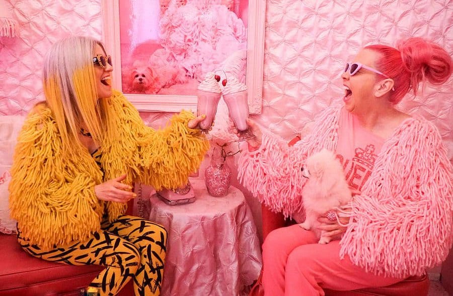 Ella London in all yellow and Kitten Kay Sera in all pink drinking pink smoothies 