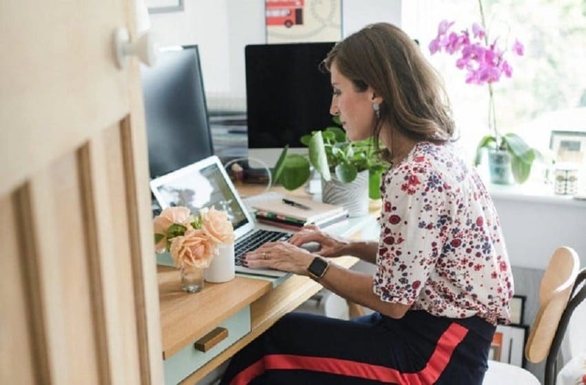 Zoe Folbigg sitting in front of a desk