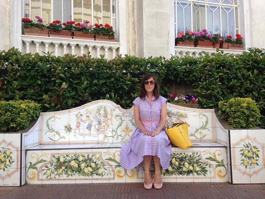 Zoe sitting on a bench