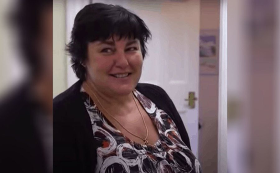 Kathy grins