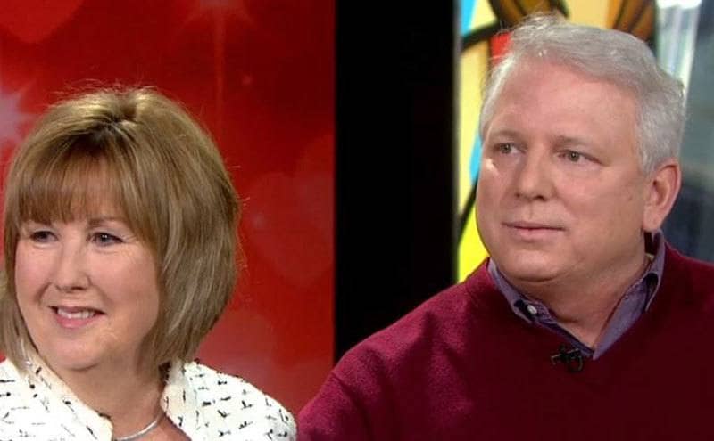 Kay and Marty speak together during a TV interview