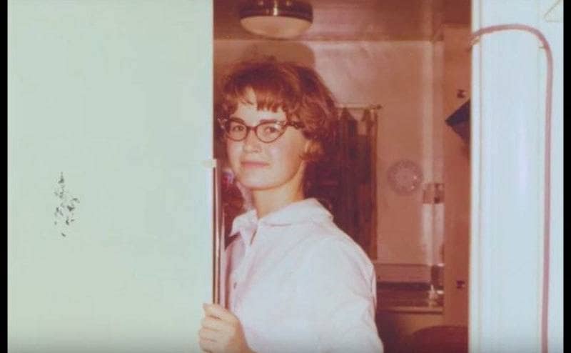 Janice Rude opening up the refrigerator 