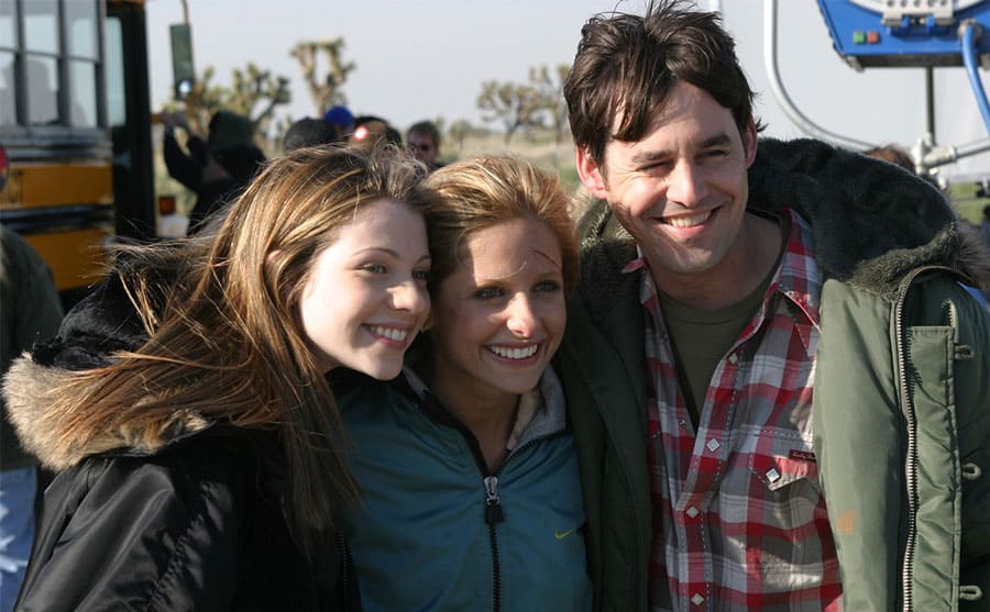 Michelle Trachtenberg, Sarah Michelle Gellar, and Nicholas Brendon behind the scenes of Buffy the Vampire Slayer