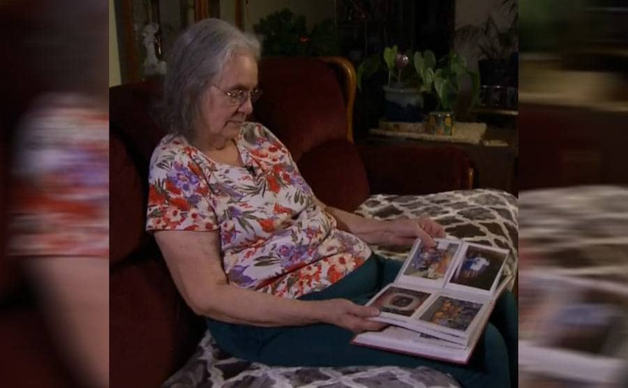 Polly looking through old photo albums