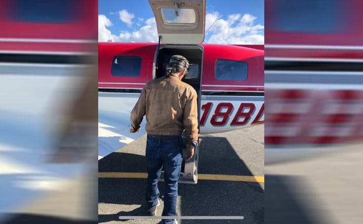 Mick about to board a plane