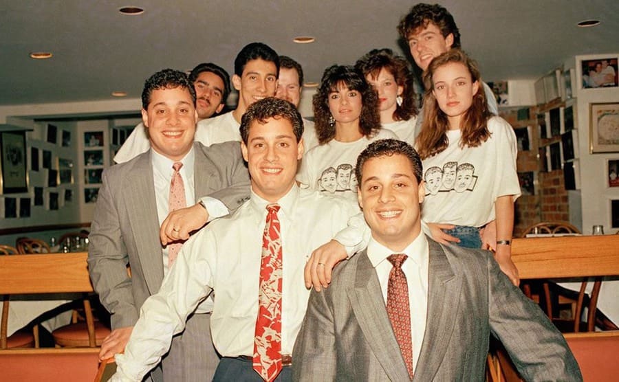 Bobby Shafran, David Kellman, and Eddy Galland surrounded by friends